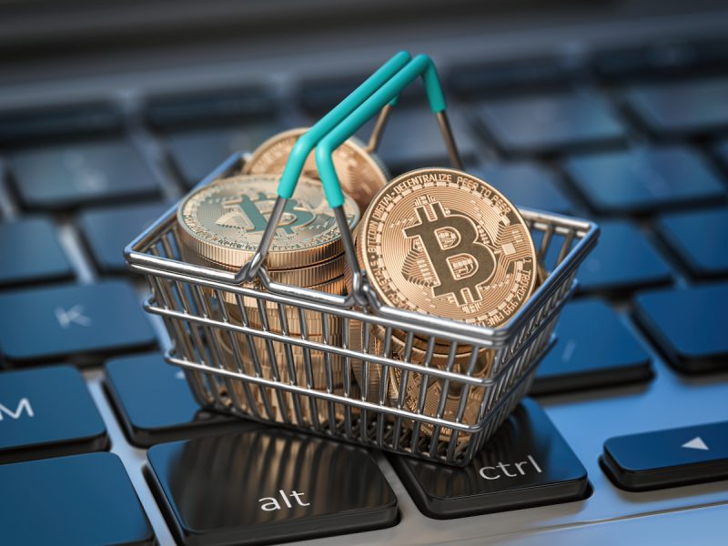 1-bitcoin-coins-in-shopping-basket-on-laptop-keyboar-2021-11-02-22-23-55-utc.jpg