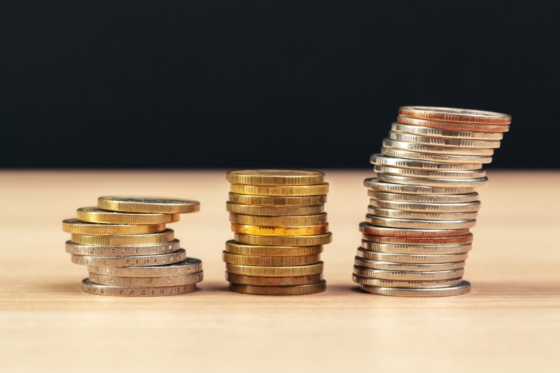 piles-of-coins-on-working-table-2021-12-23-15-46-22-utc.jpg